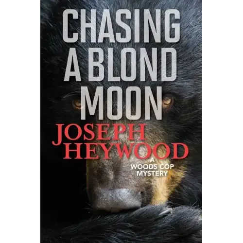 Chasing a Blond Moon: A Woods Cop Mystery