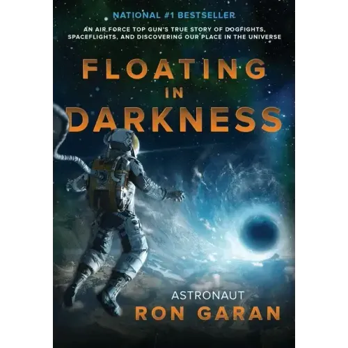 Floating in Darkness: An Air Force Top Gun's True Story of Dogfights, Spaceflights, and Discovering Our Place in the Universe