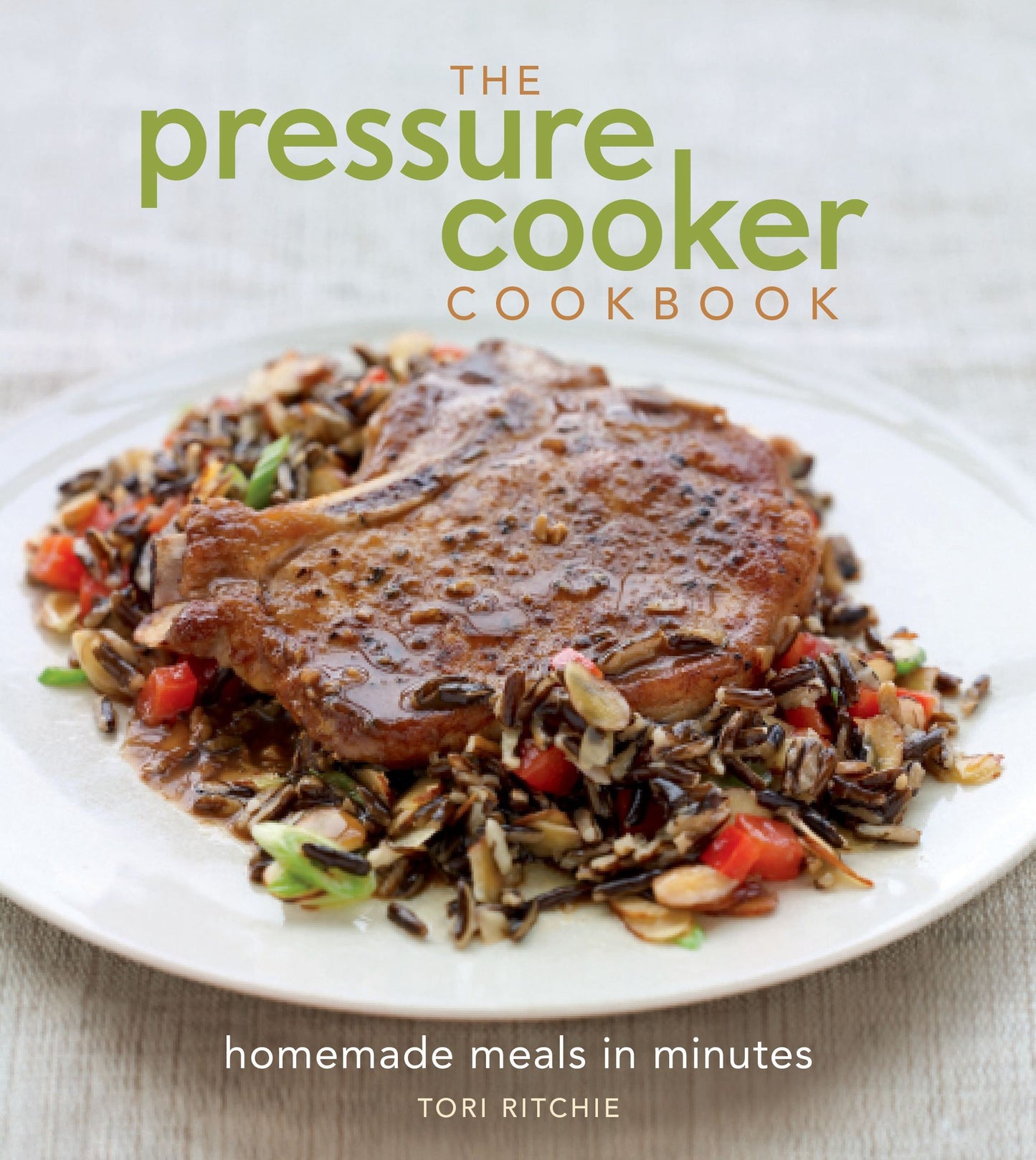 The Pressure Cooker Cookbook Hardcover Book