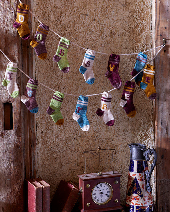 Harry Potter: Knitting Magic: More Patterns From Hogwarts and Beyond Hardcover Book