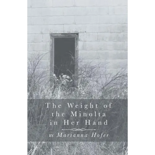 The Weight of the Minolta in Her Hand