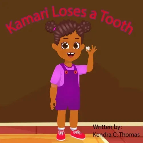 Kamari Loses a Tooth